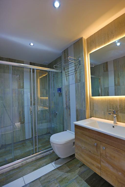 Wonasis Resort & Aqua Hotel Kargipinari Pokoj fotografie