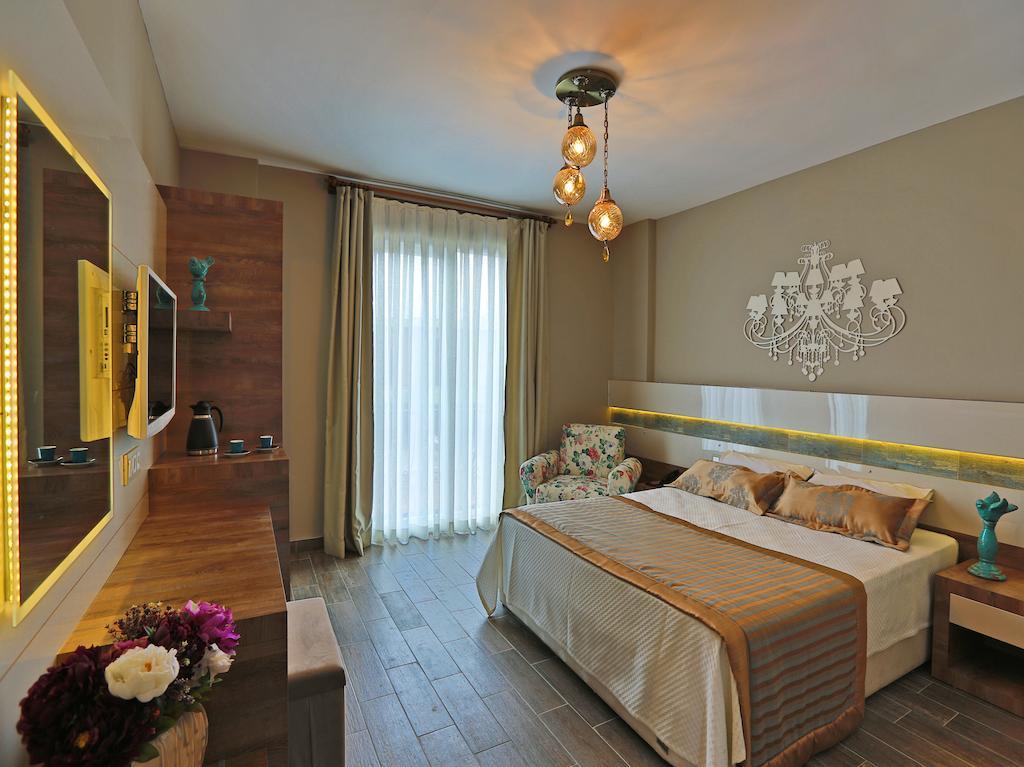 Wonasis Resort & Aqua Hotel Kargipinari Pokoj fotografie
